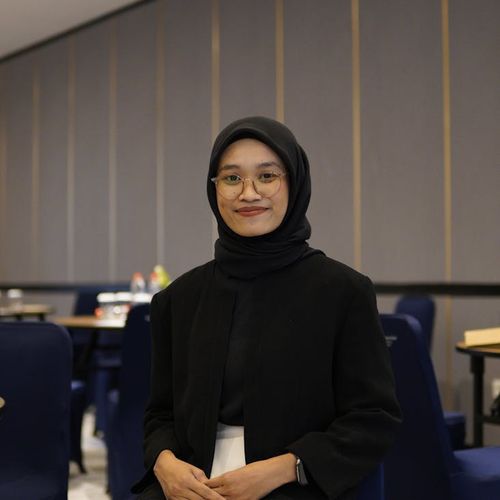 Portrait of a smiling, confident man in sportswear.